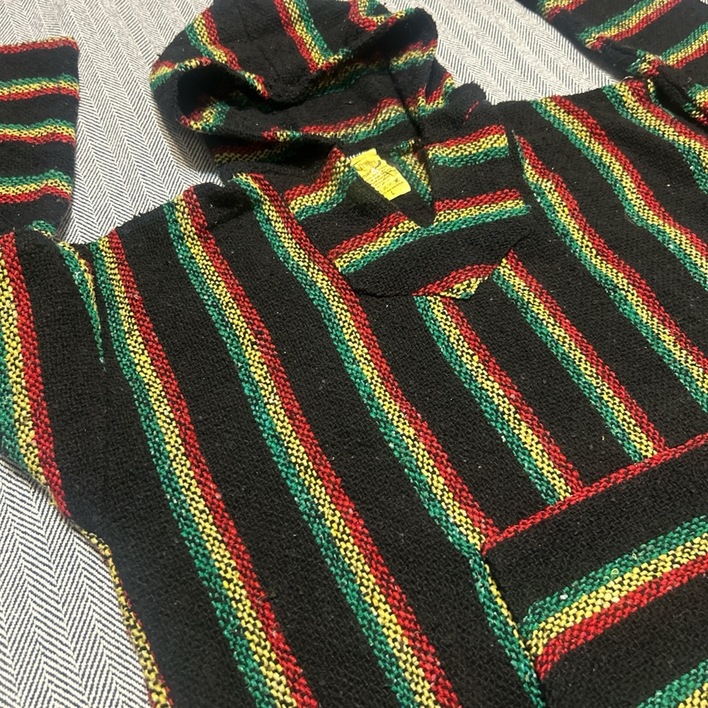 Vibrant Striped V-Neck Sweater rug hoodie